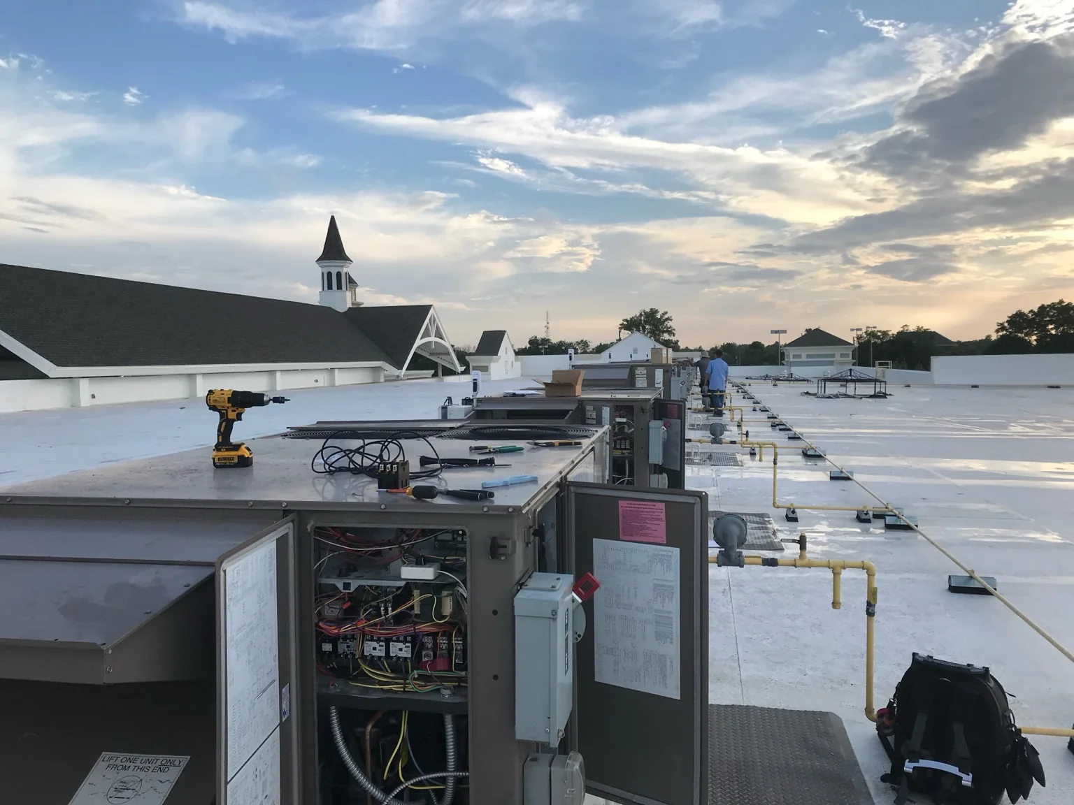 Commercial rooftop HVAC service environment with multiple units